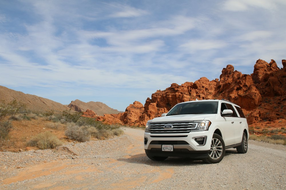4x4 vehicle navigating sand track